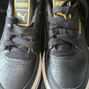 Puma Kids Black and Gold Sneakers